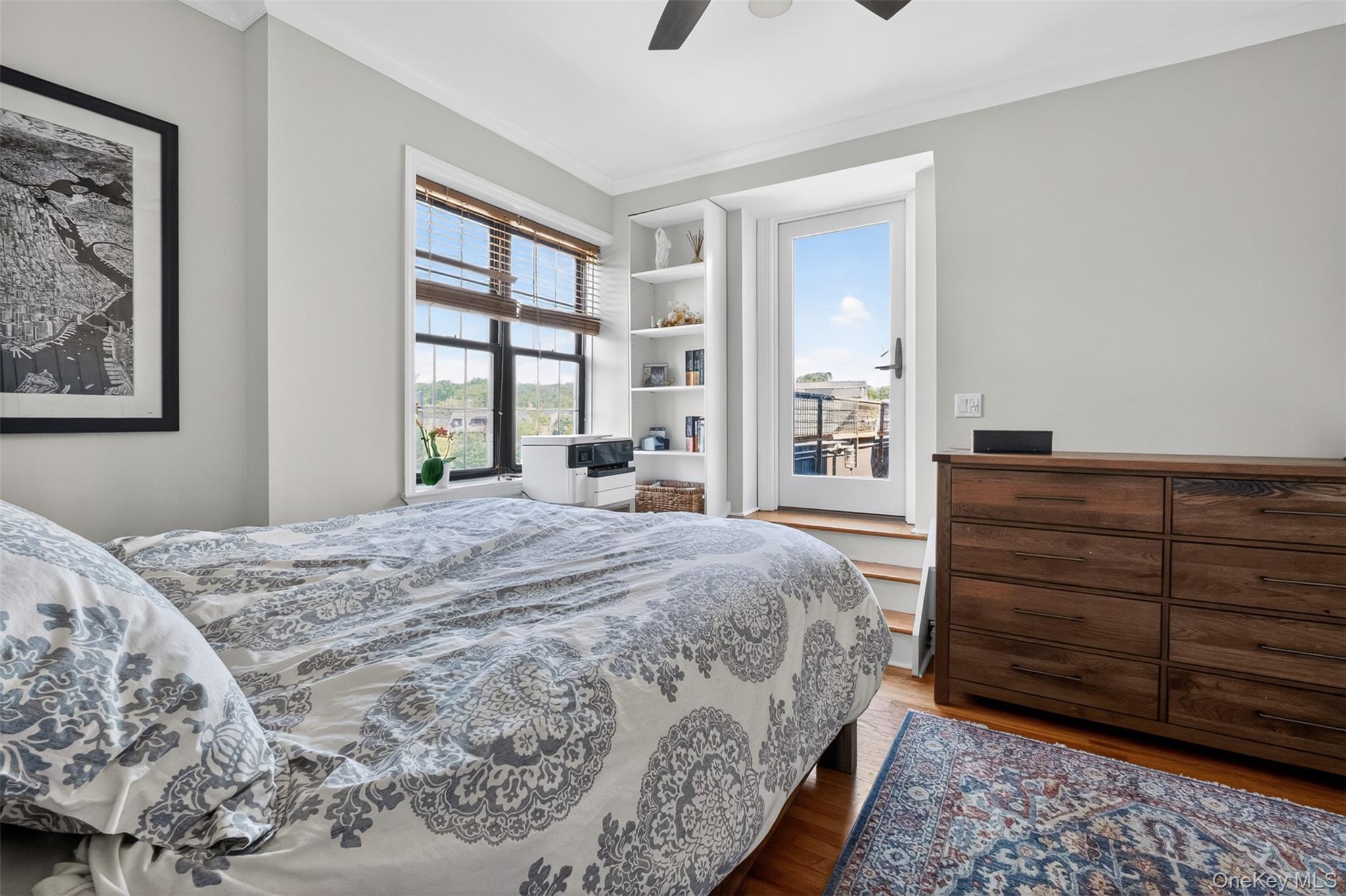 824 Bronx River Road, Unit 7C Bronxville, NY 10708 - Photo 8 of 13 a bedroom with a bed and a dresser