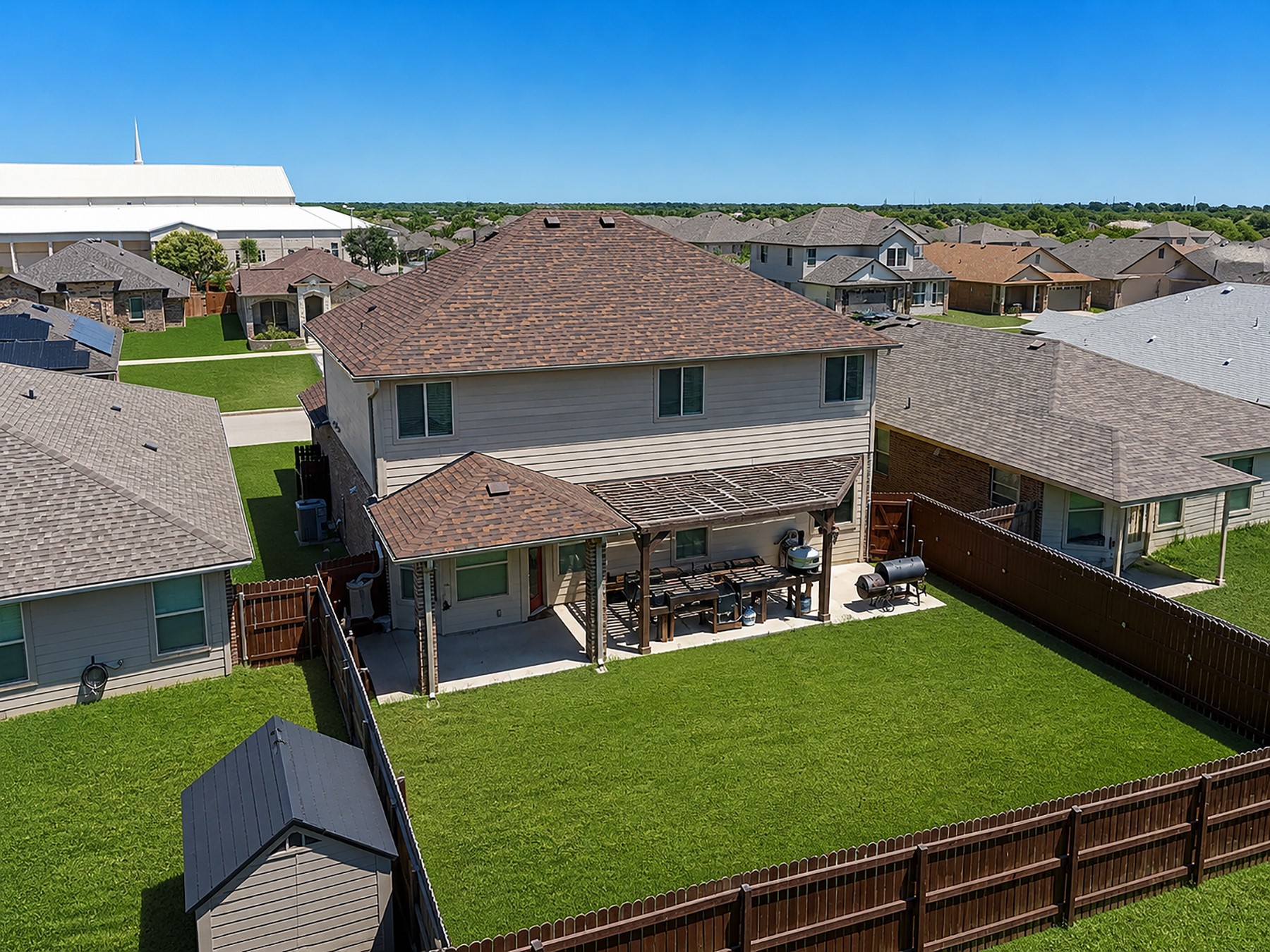 237 Bethann Drive Temple, TX 76502 - Photo 3 of 37 Expansive fenced backyard featuring a generous lawn, concrete patio, and a covered pergola