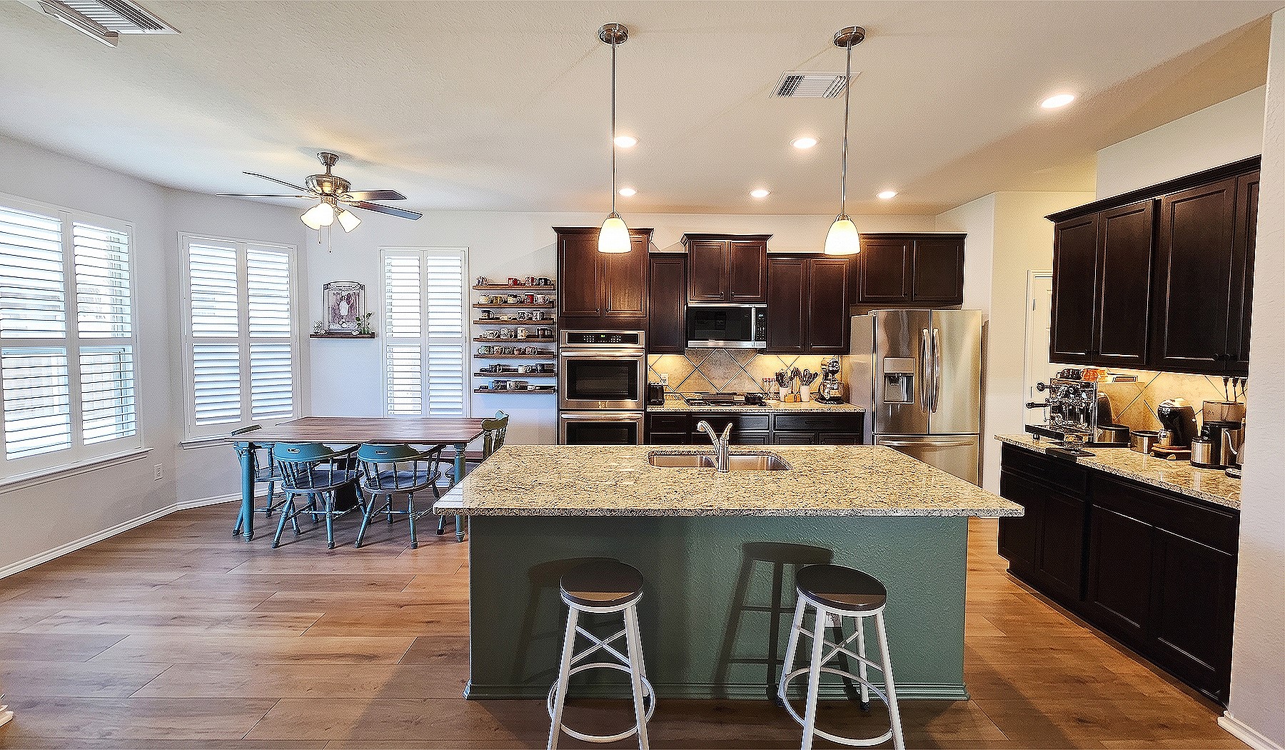 237 Bethann Drive Temple, TX 76502 - Photo 6 of 37 Spacious kitchen with a central island featuring a granite countertop and pendant lighting