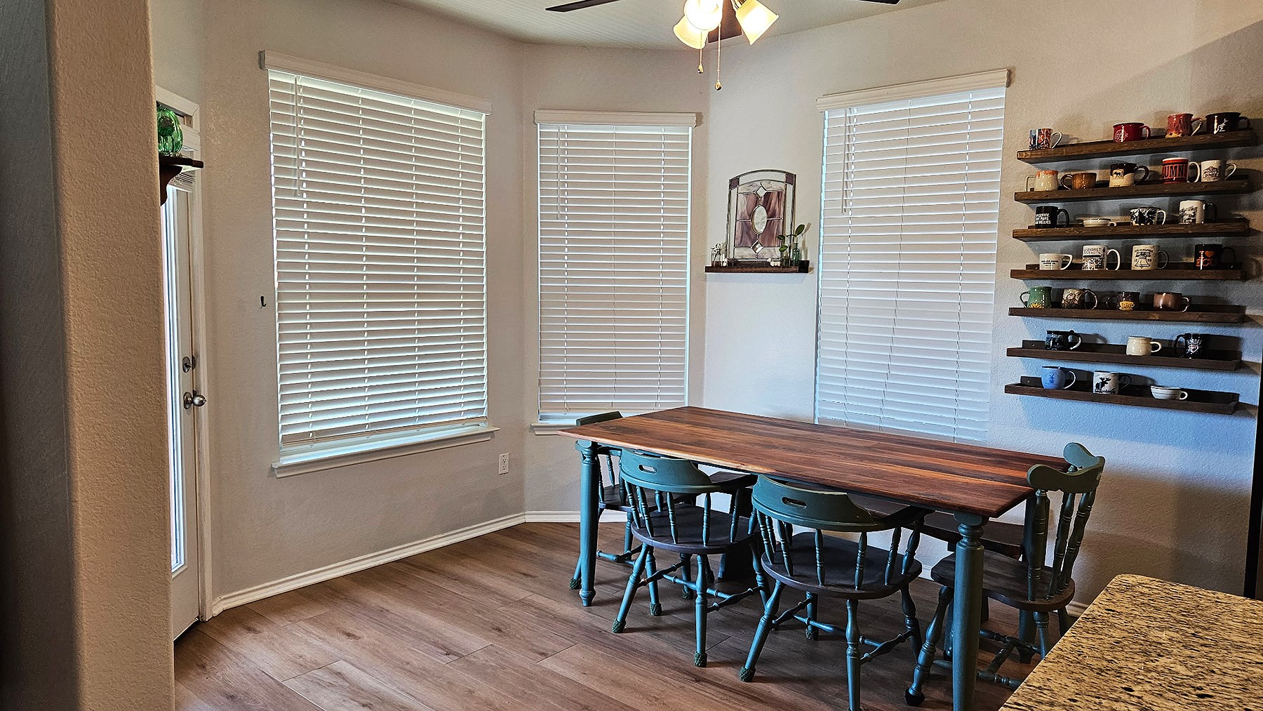 237 Bethann Drive Temple, TX 76502 - Photo 9 of 37 Breakfast nook featuring wood-finish flooring, a ceiling fan, and multiple windows with blinds