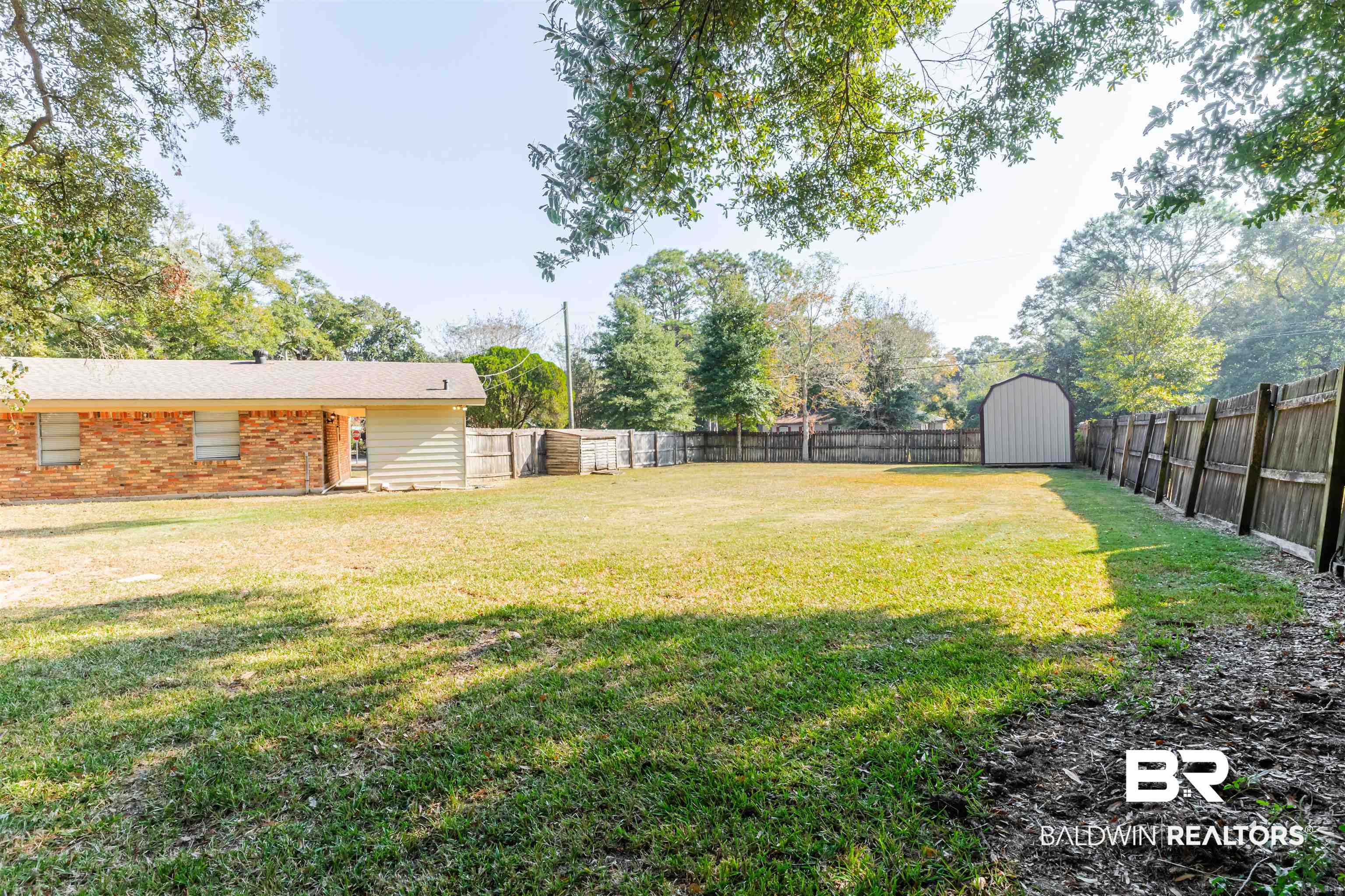 3970 Oak Ridge Avenue Mobile, AL 36619 - Photo 27 of 28 View of yard with a storage unit
