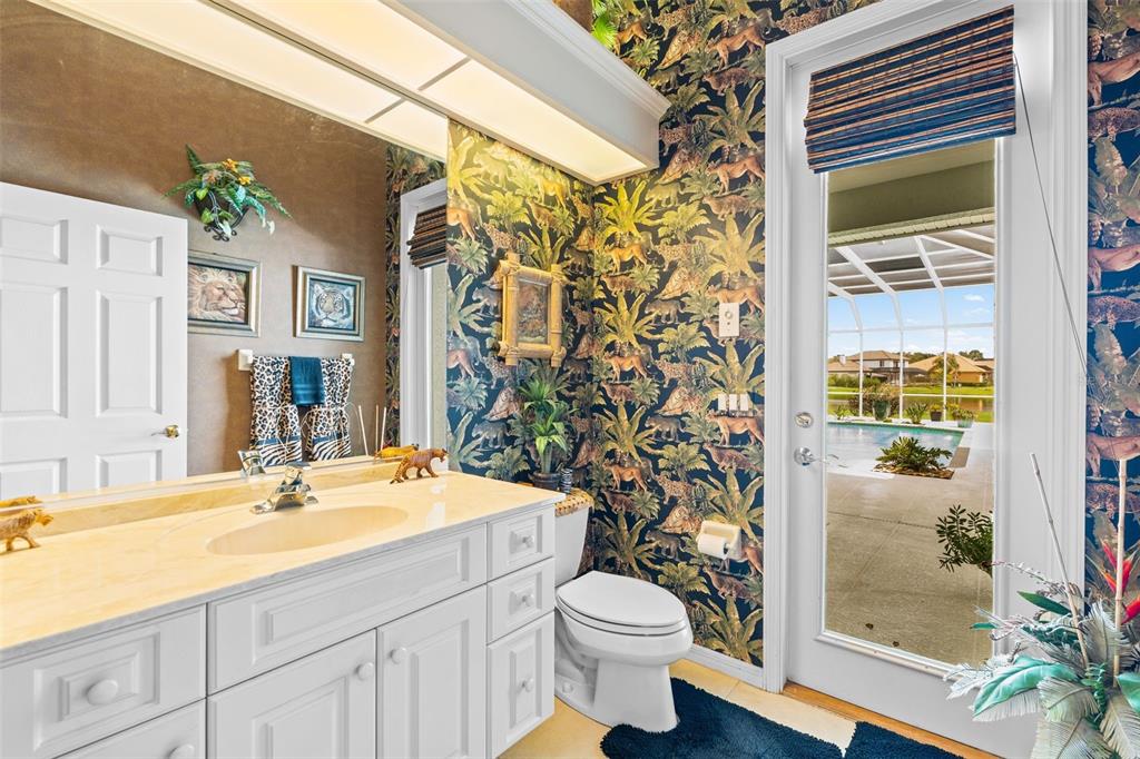 7517 Coventry Court Lakewood Ranch, FL 34202 - Photo 13 of 96 a bathroom with a granite countertop sink and a mirror