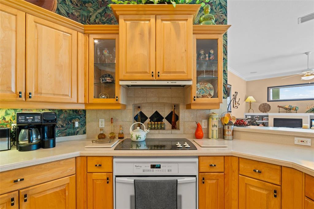 7517 Coventry Court Lakewood Ranch, FL 34202 - Photo 23 of 96 a kitchen with stainless steel appliances granite countertop a sink and cabinets