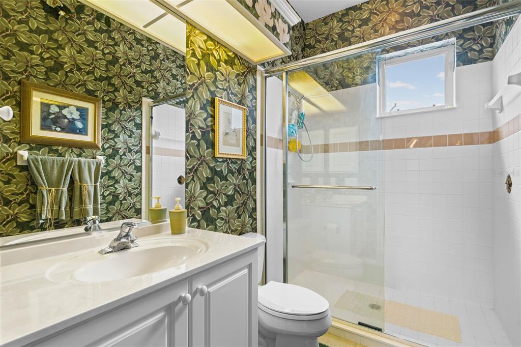 7517 Coventry Court Lakewood Ranch, FL 34202 - Photo 49 of 96 a bathroom with a sink and a mirror