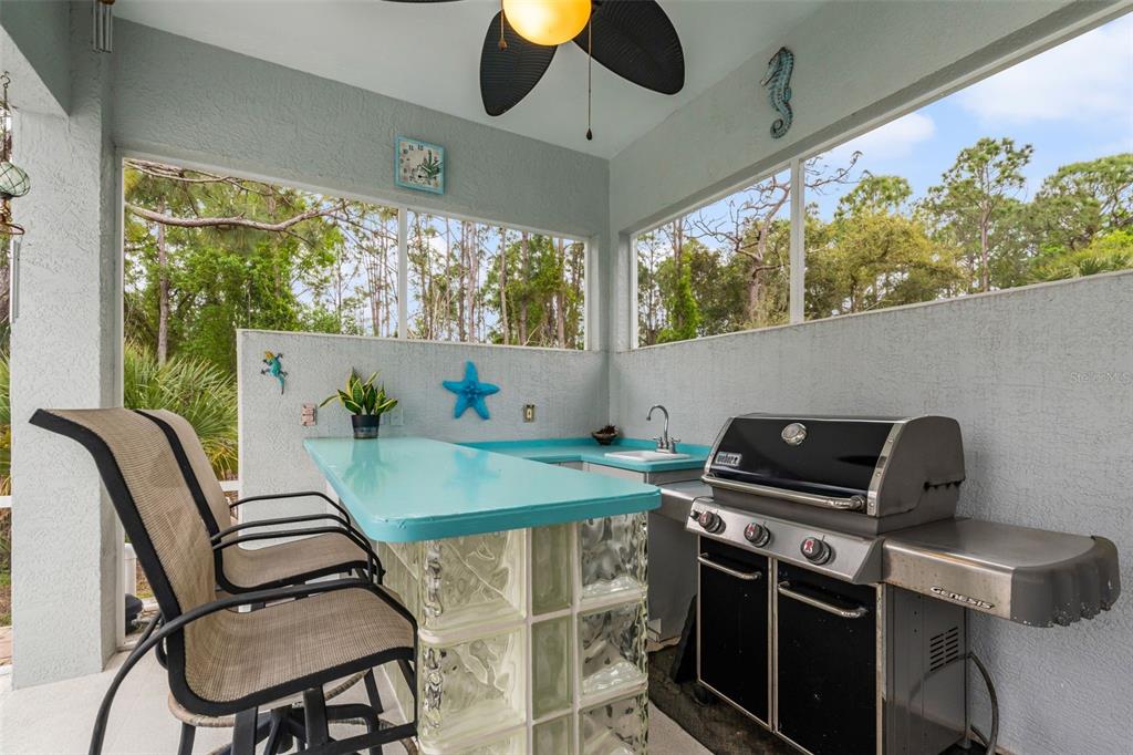7517 Coventry Court Lakewood Ranch, FL 34202 - Photo 64 of 96 a view of a dining room with furniture window and outside view