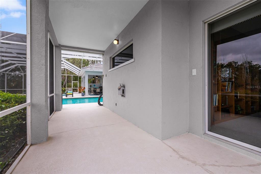 7517 Coventry Court Lakewood Ranch, FL 34202 - Photo 69 of 96 a view of a house with porch and windows