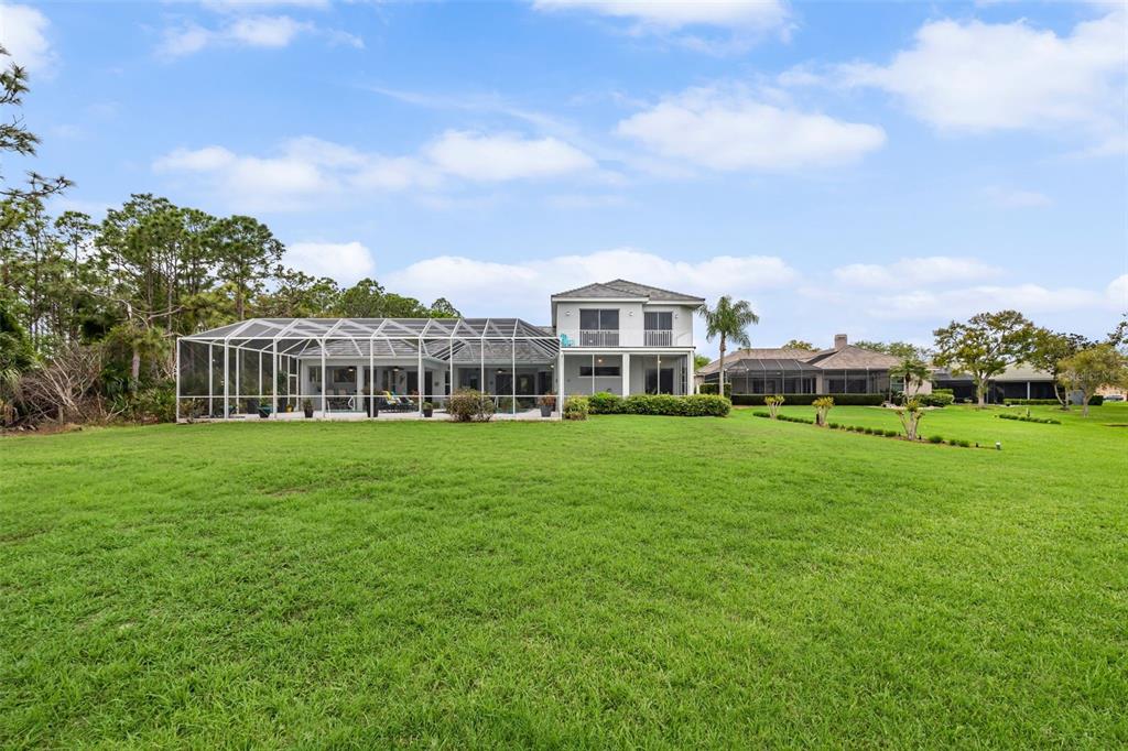 7517 Coventry Court Lakewood Ranch, FL 34202 - Photo 71 of 96 a view of a house with a big yard