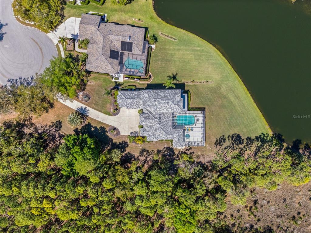 7517 Coventry Court Lakewood Ranch, FL 34202 - Photo 80 of 96 an aerial view of a house with a yard