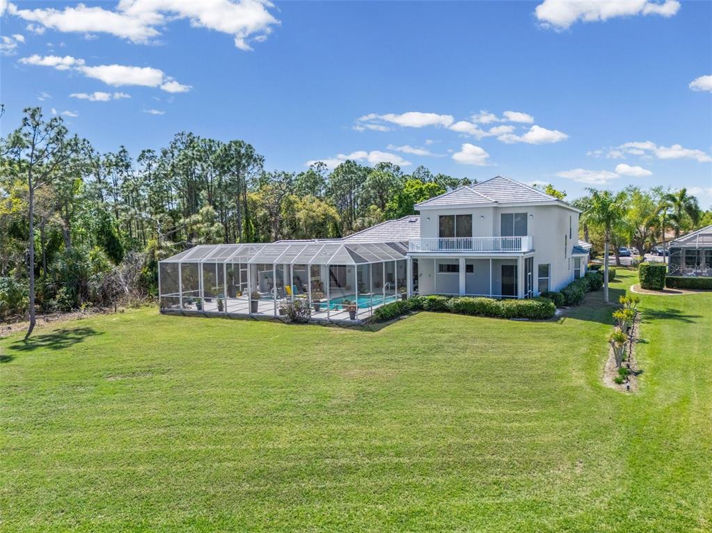 7517 Coventry Court Lakewood Ranch, FL 34202 - Photo 85 of 96 a front view of a house with garden