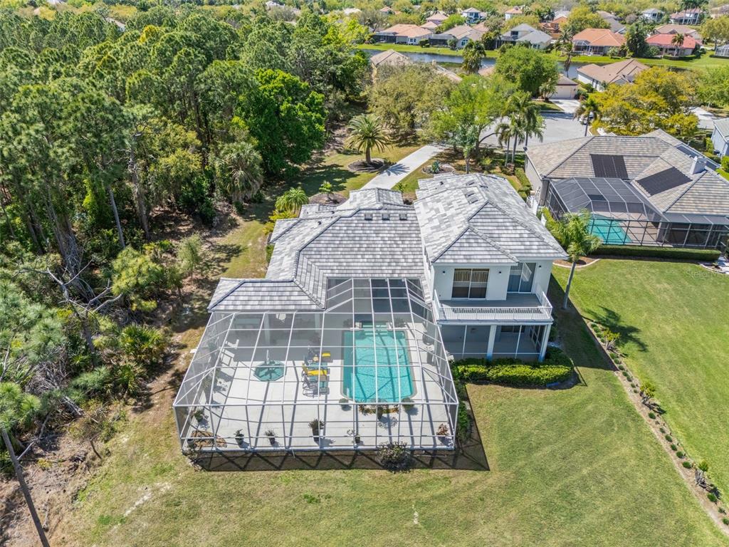 7517 Coventry Court Lakewood Ranch, FL 34202 - Photo 89 of 96 an aerial view of a house with a yard