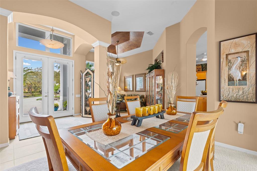7517 Coventry Court Lakewood Ranch, FL 34202 - Photo 9 of 96 a view of a dining room and livingroom with furniture