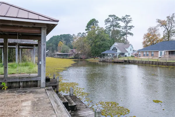 a view of a lake with a house