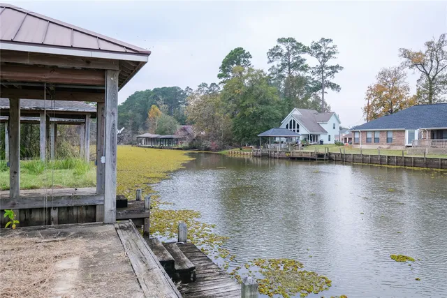 a view of door with wooden floor