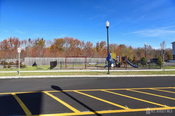 a view of a wrought iron fences in front of house