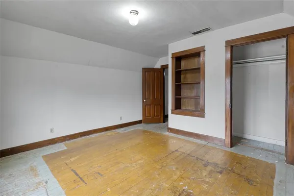 an empty room with closet