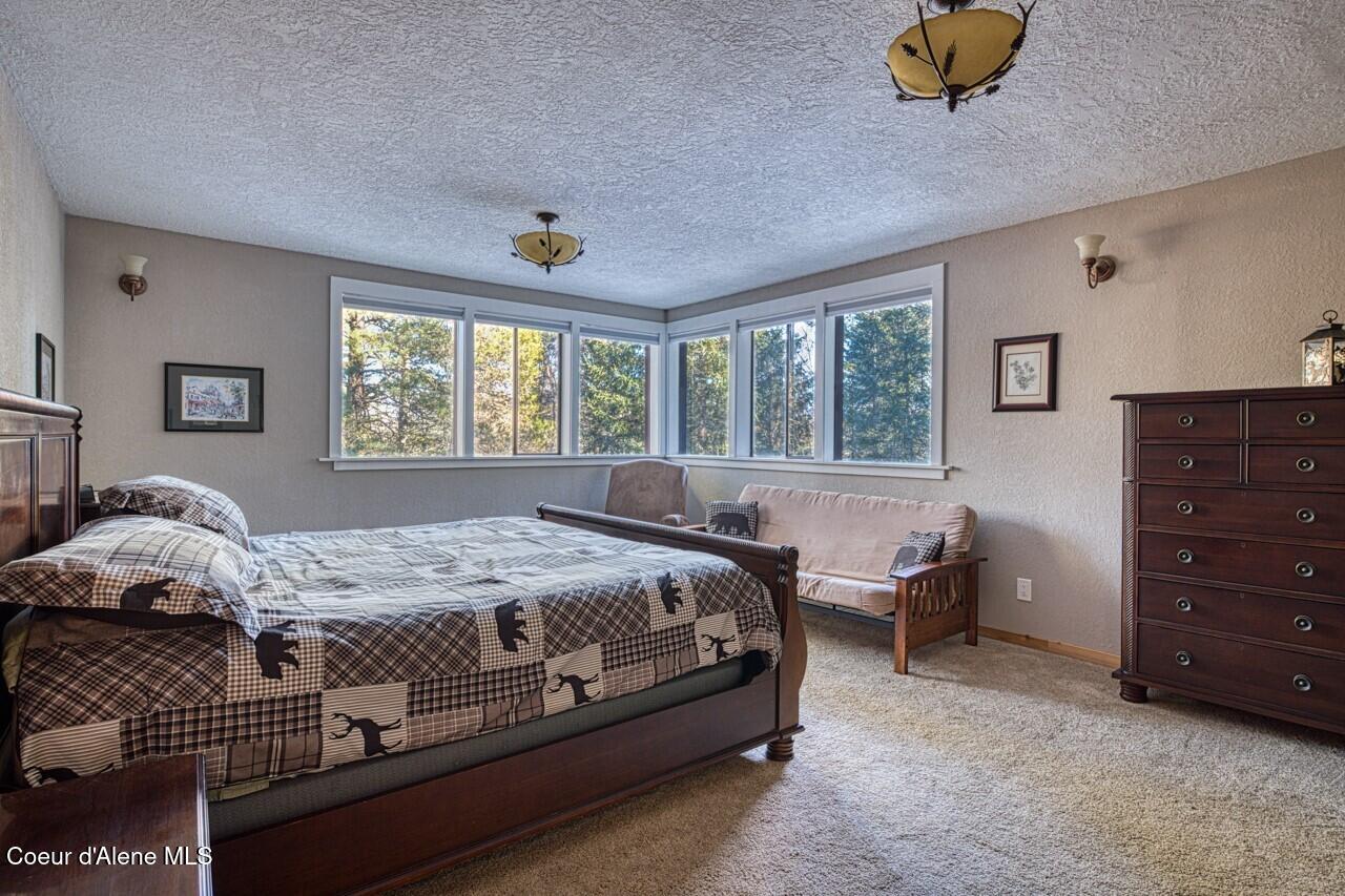 2298 Selkirk Road Sandpoint, ID 83864 - Photo 23 of 52 Master Suite