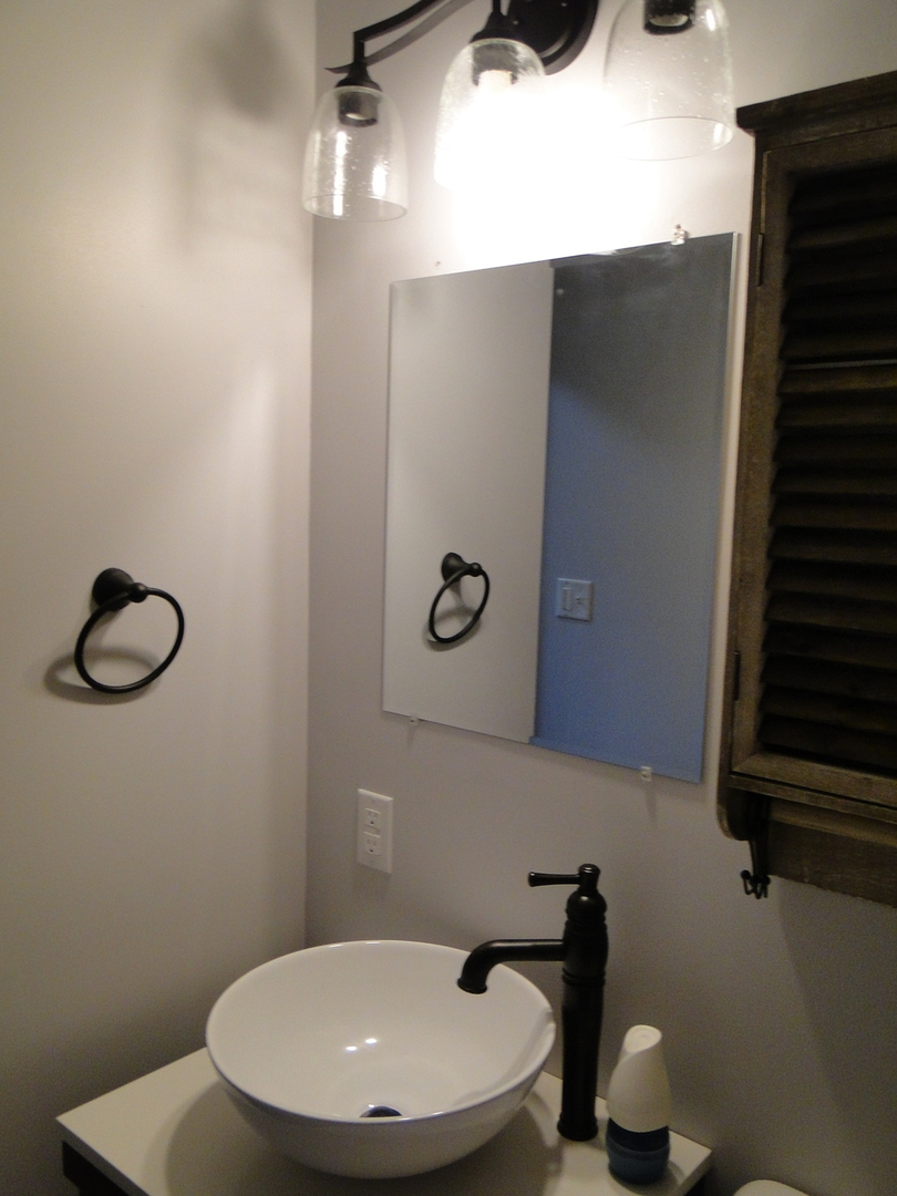 839 County Rd S 419 East Kankakee, IL 60901 - Photo 17 of 20 a bathroom with a toilet and a sink