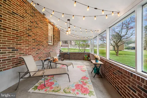 a outdoor space with lots of potted plants