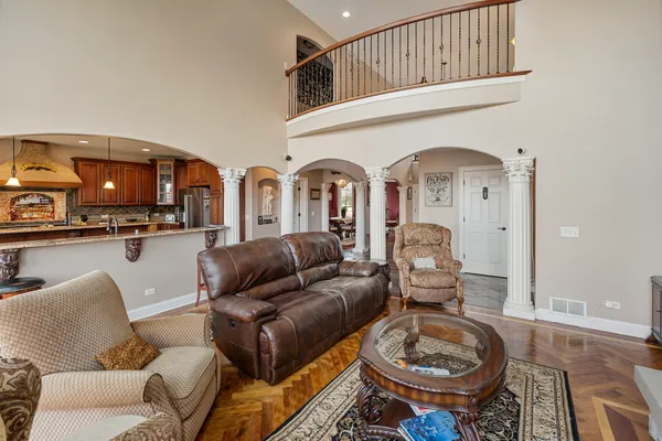 a kitchen with stainless steel appliances granite countertop a stove and a refrigerator
