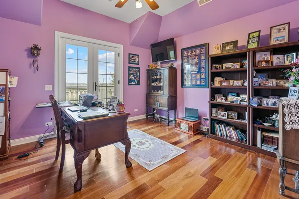 a living room with lots of furniture and a rug