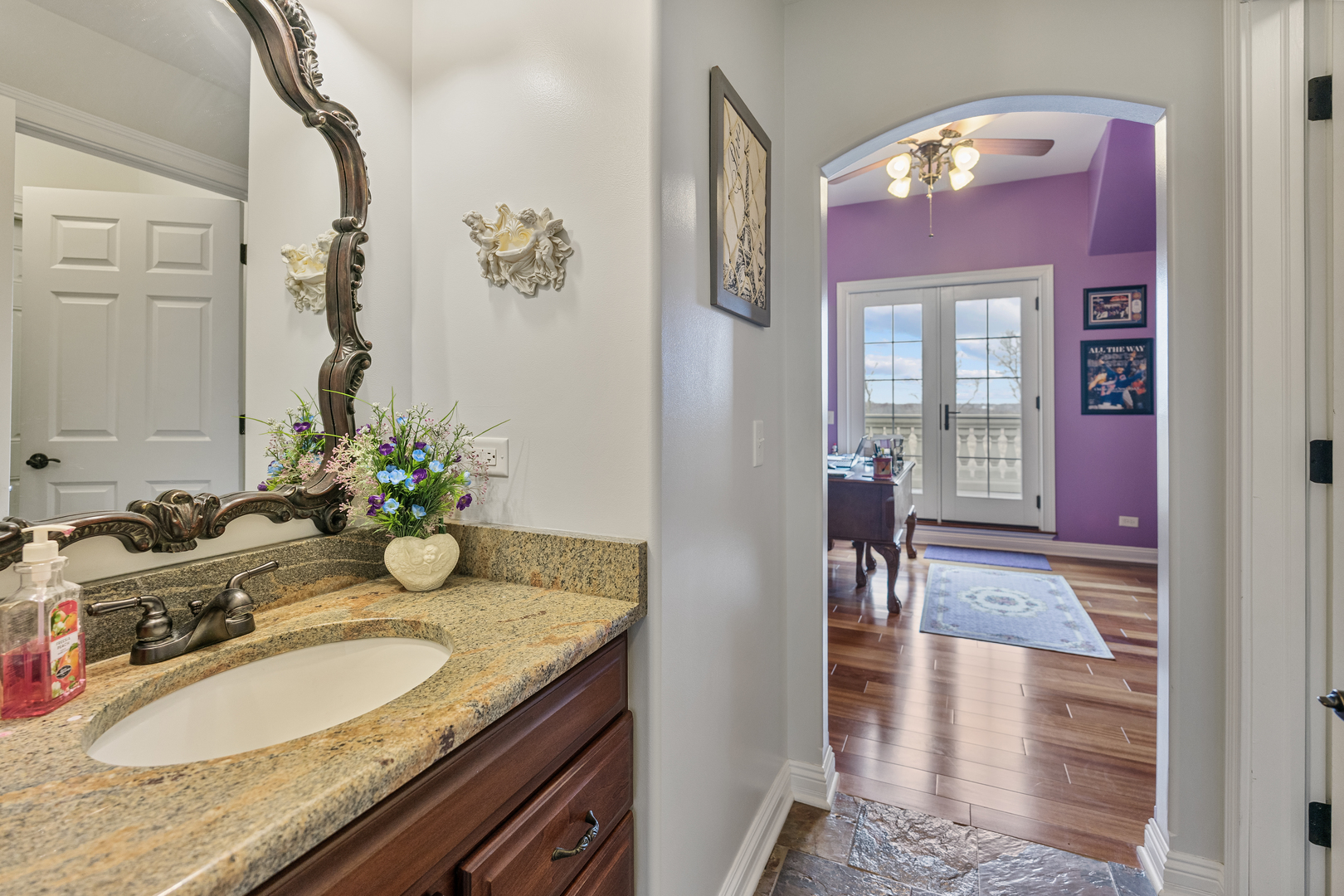 4220 Northgate Drive Spring Grove, IL 60081 - Photo 47 of 105 a bathroom with a granite countertop sink a mirror and a shower