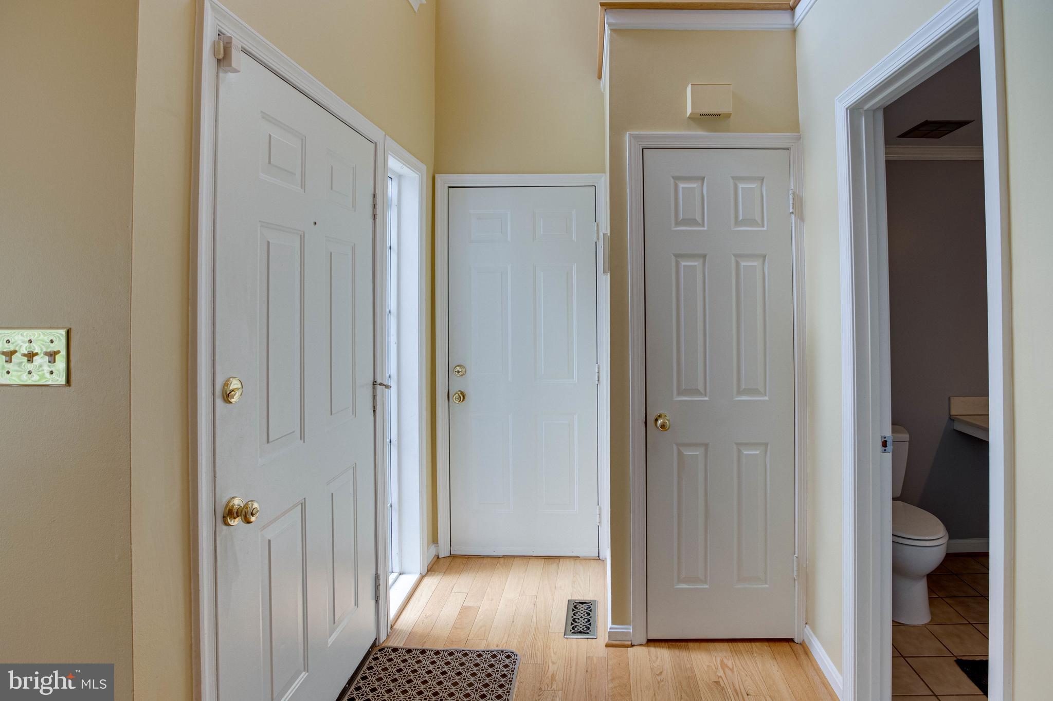 1542 Deer Point Way Reston, VA 20194 - Photo 4 of 68 Inviting Entrance with Gleaming Hardwood Floors