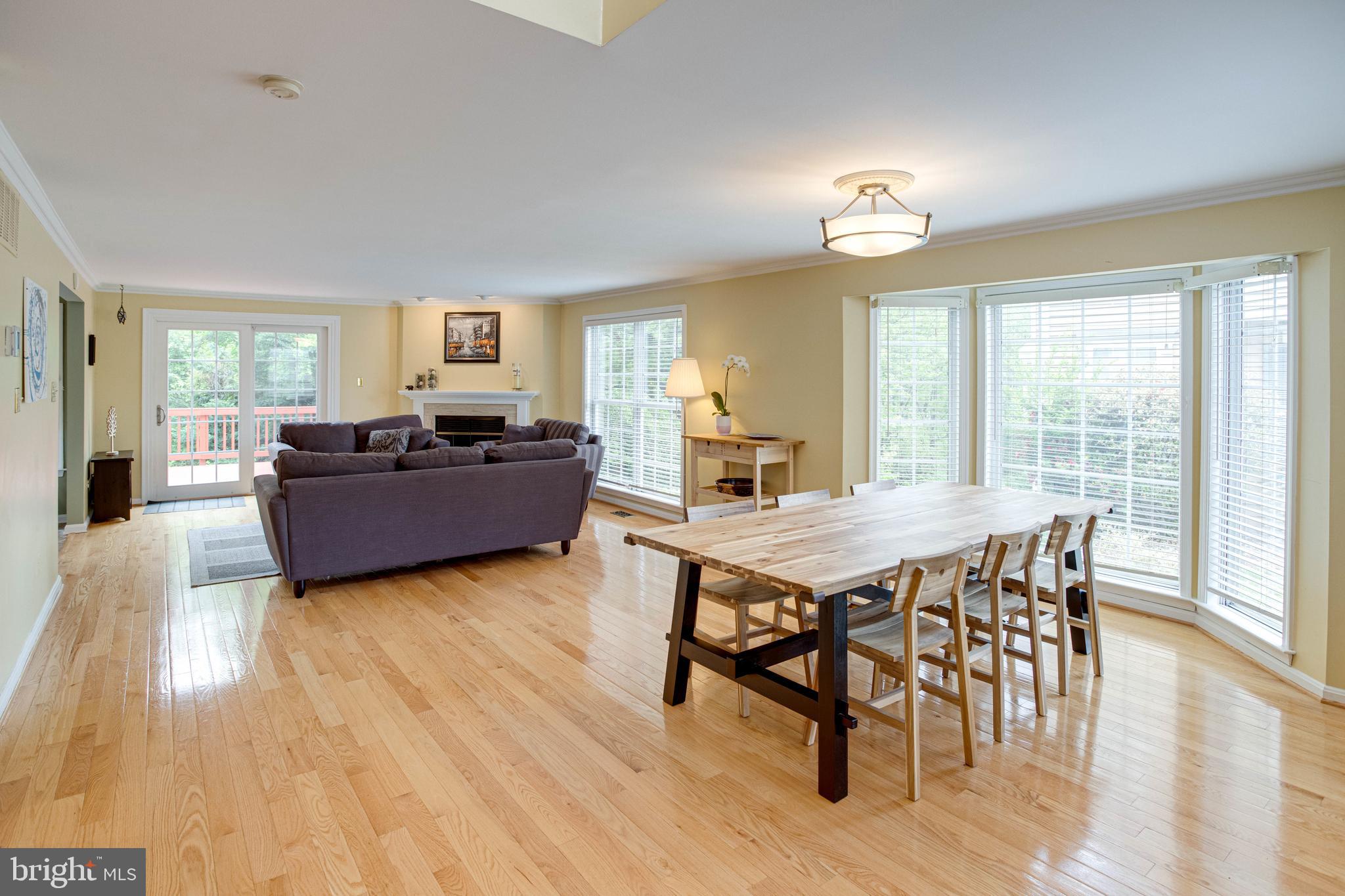 1542 Deer Point Way Reston, VA 20194 - Photo 7 of 68 Sun-Filled Dining and Living Areas