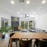 a view of a dining room with furniture window and outside view