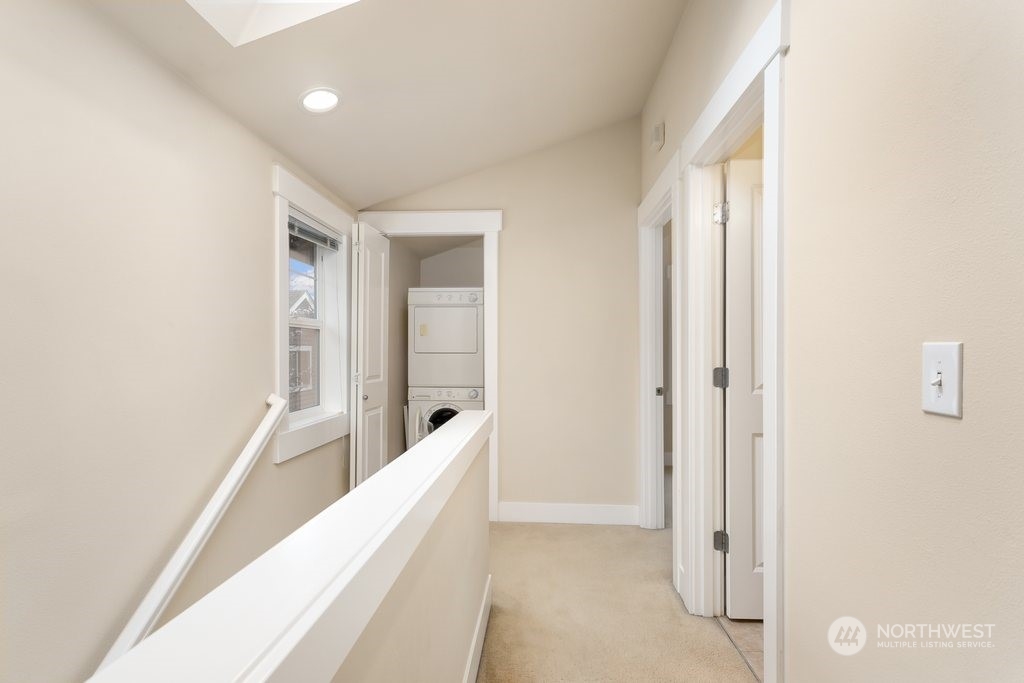 910 Northwest 85th Street, Unit A Seattle, WA 98117 - Photo 16 of 29 a view of hallway with windows