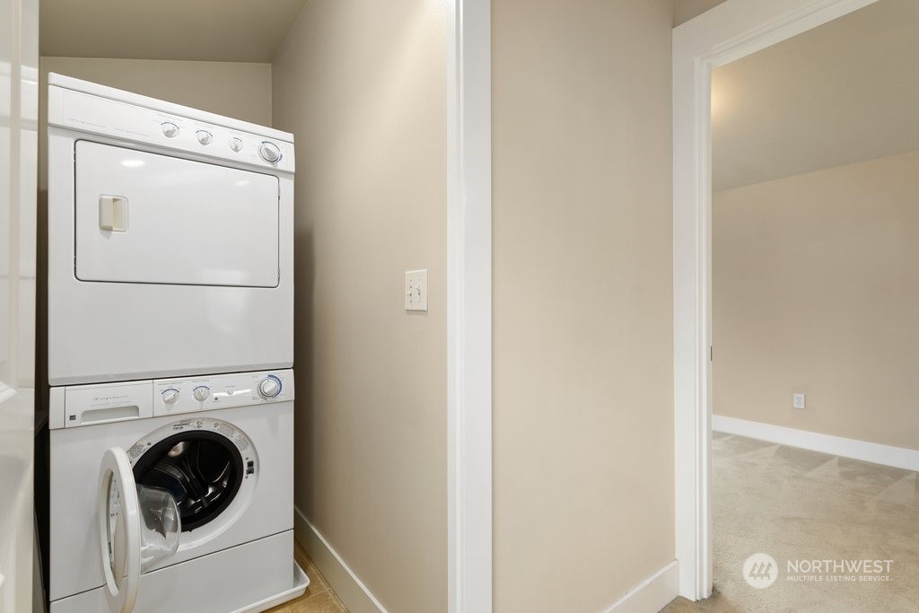 910 Northwest 85th Street, Unit A Seattle, WA 98117 - Photo 27 of 29 a utility room with dryer and washer