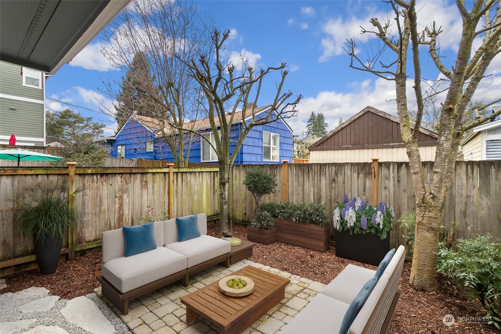 910 Northwest 85th Street, Unit A Seattle, WA 98117 - Photo 3 of 29 a view of a couches on the roof deck
