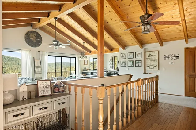a view of a livingroom with furniture and windows