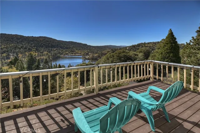 a view of a two chairs in the deck
