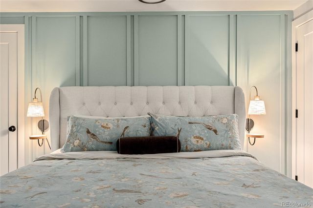 a bed room with a bed and a couch