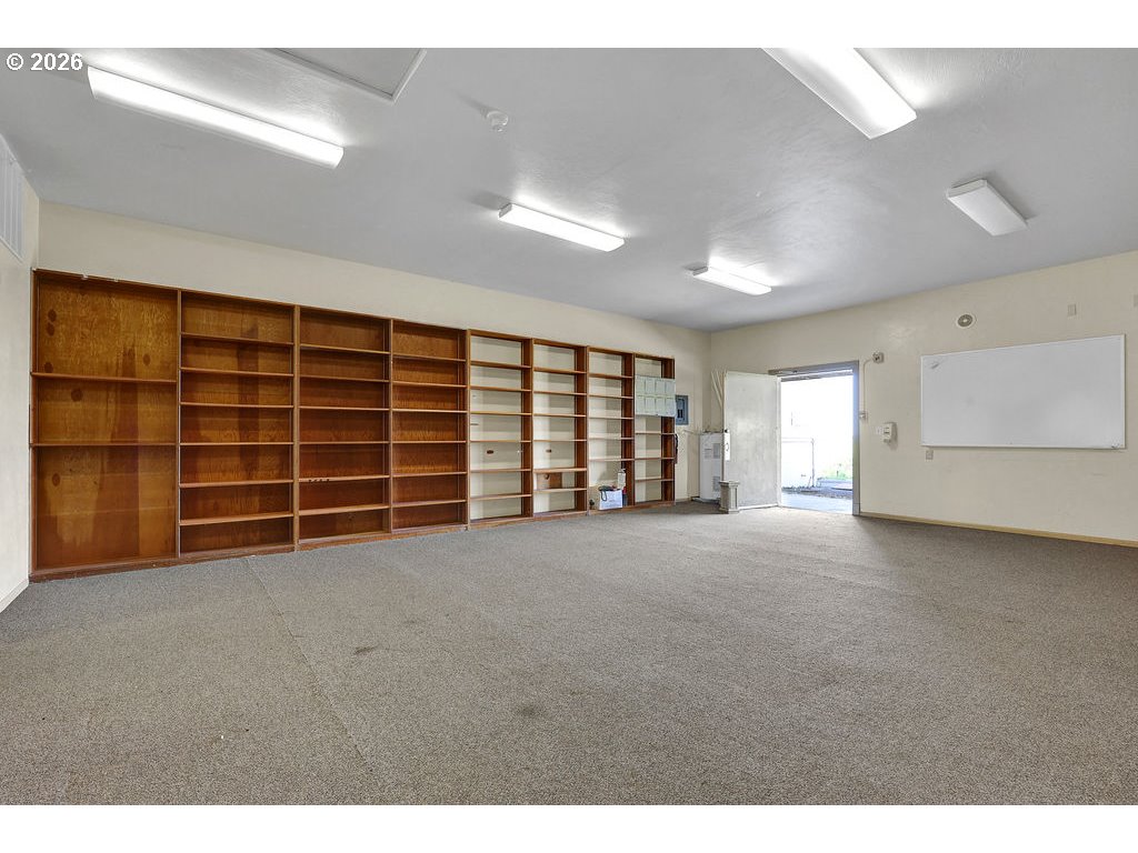 21211 Coburg Road Harrisburg, OR 97446 - Photo 42 of 48 a view of an empty room with a window