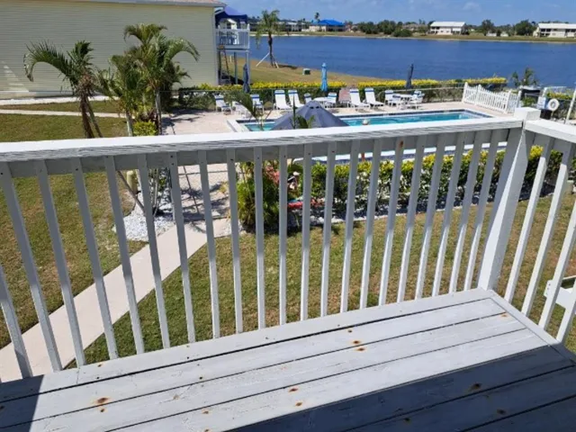 a bathroom with a sink a toilet and vanity