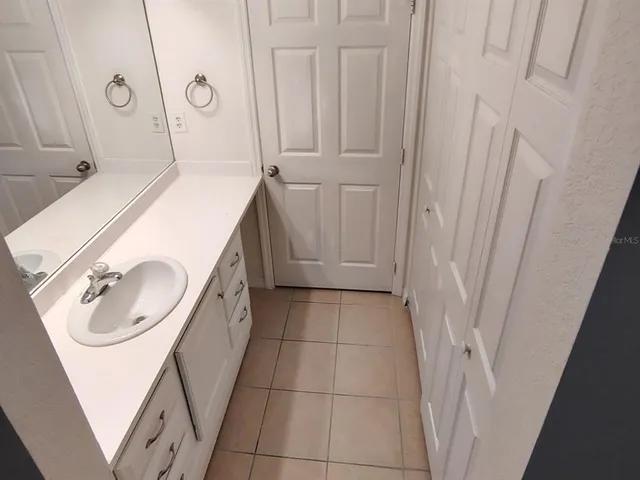 a bathroom with a shower and toilet