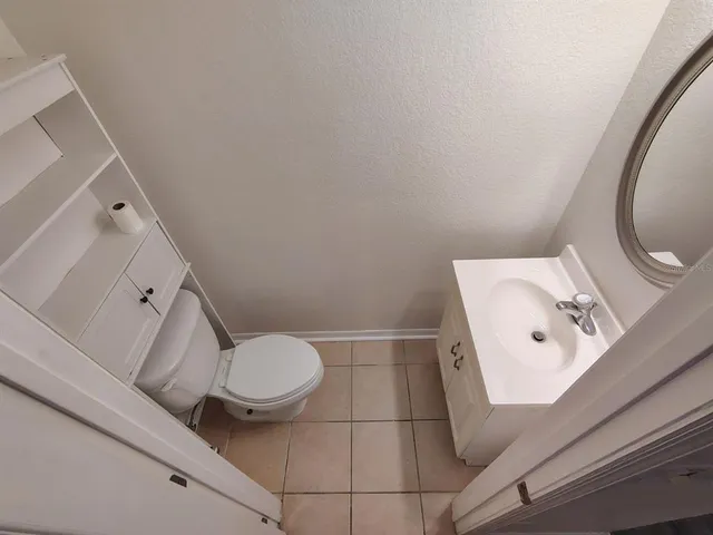 a bathroom with a toilet and a sink
