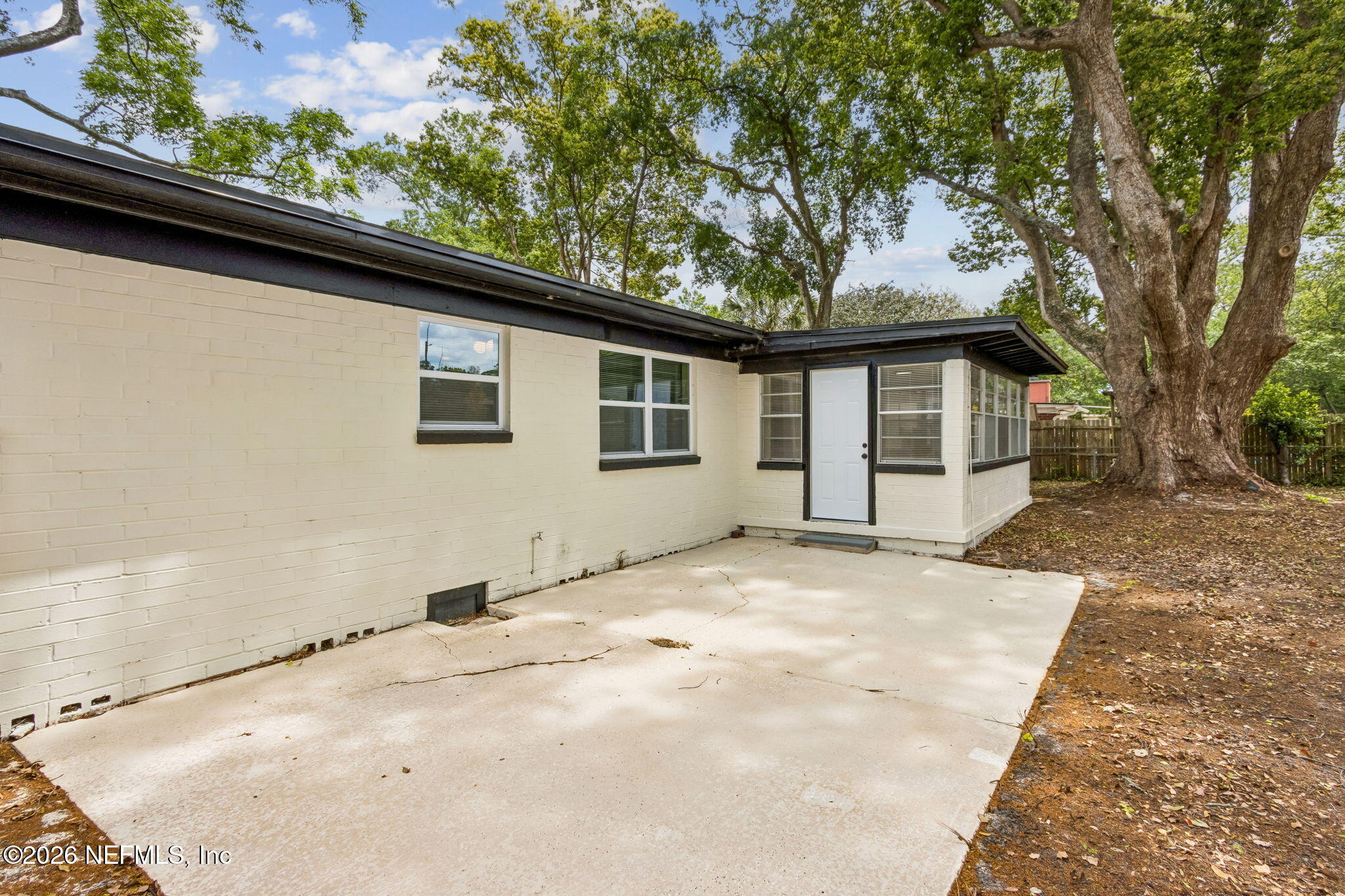 3668 Marianna Road Jacksonville, FL 32217 - Photo 25 of 28 a view of a house with a backyard
