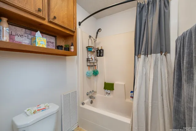 a picture of a bench in a white wall