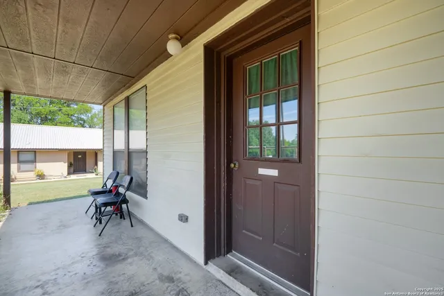 a view of a kitchen with washer and dryer