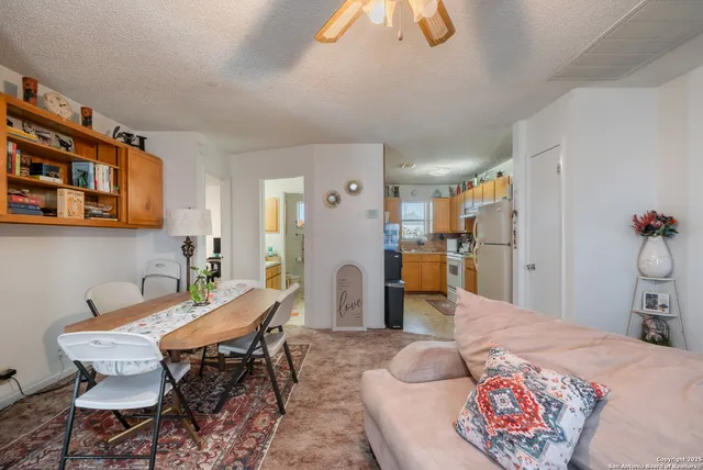 a bedroom with a bed and chair