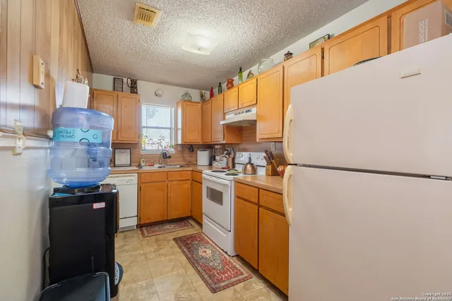 a bedroom with a bed and furniture