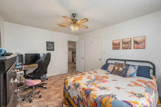 a bathroom with a sink toilet and mirror