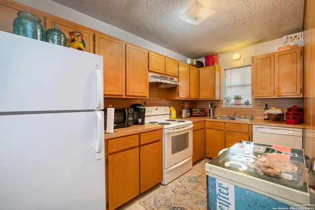 a bedroom with bed and a window