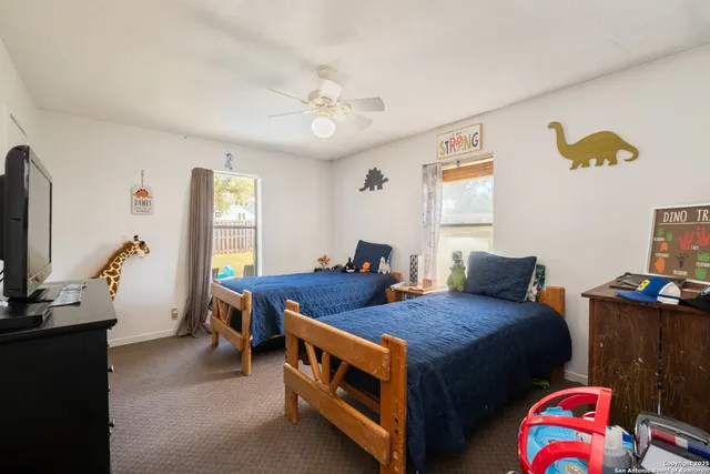 a view of house with outdoor space and sitting area