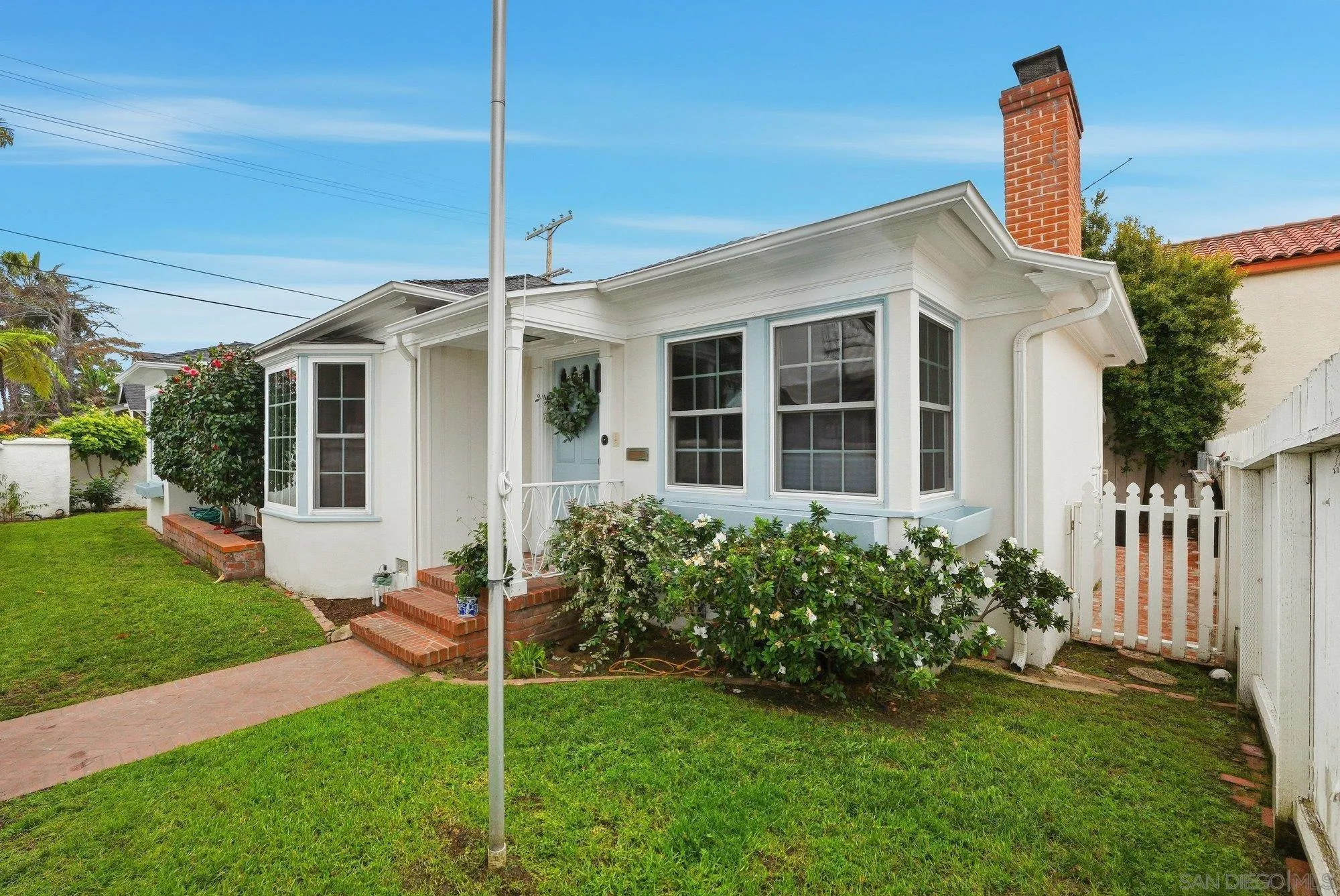 1210 Third Street Coronado, CA 92118 - Photo 1 of 22 a view of a house with a yard