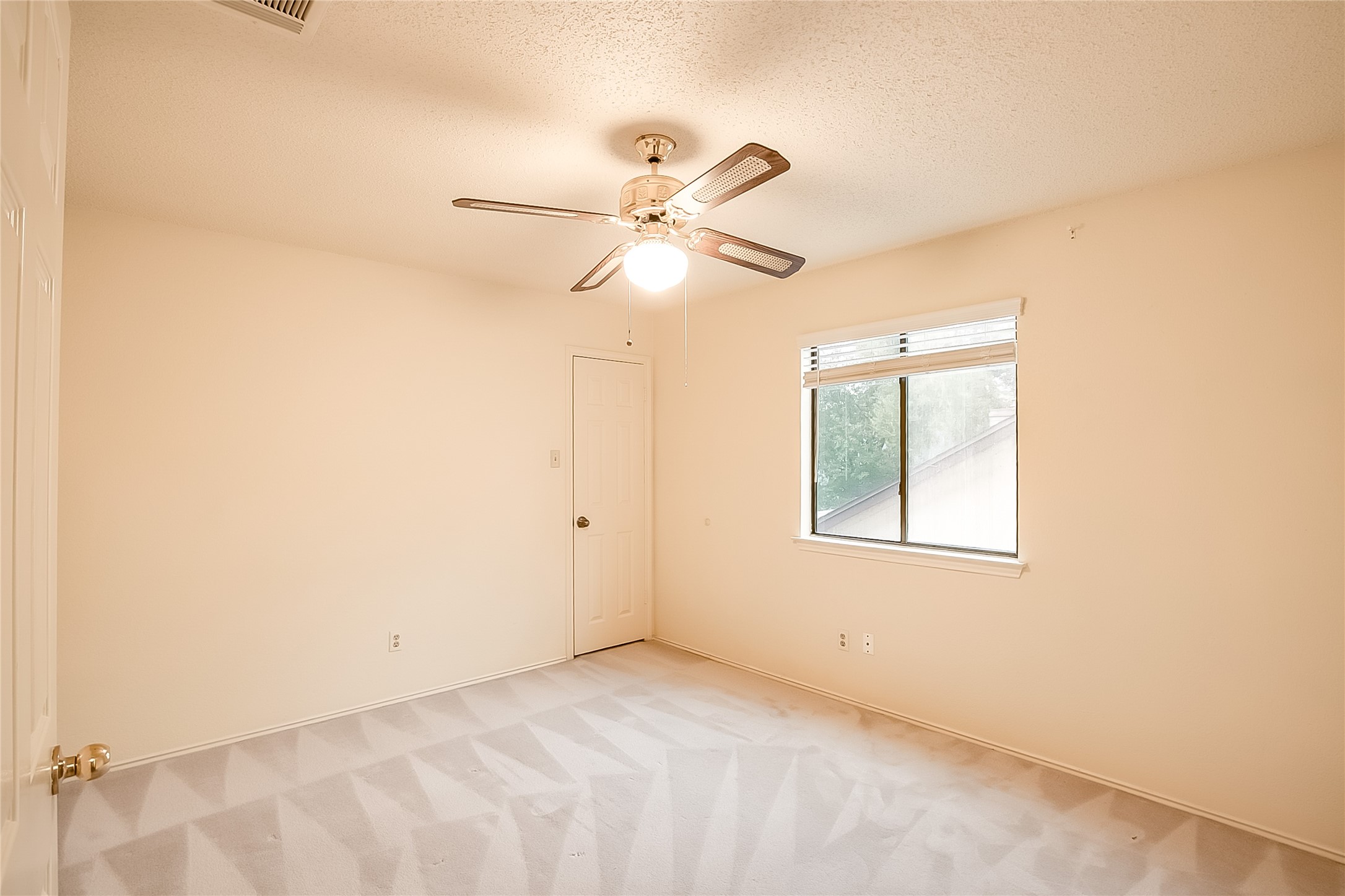 6914 Dallas Drive Austin, TX 78729 - Photo 25 of 31 a view of an empty room with a window