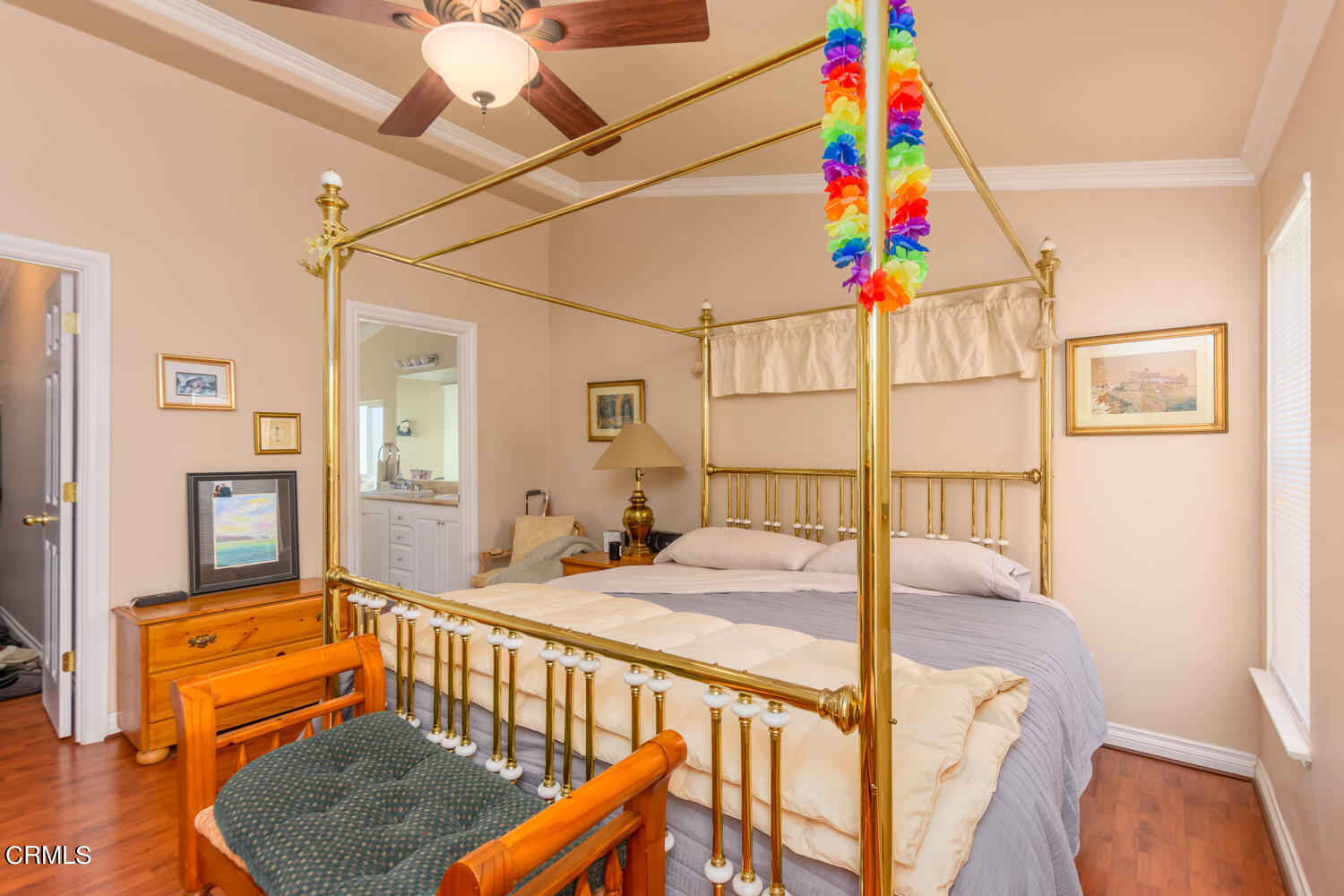 11405 Darling Road, Unit 1 Ventura, CA 93004 - Photo 13 of 31 a bedroom with furniture and a wooden floor