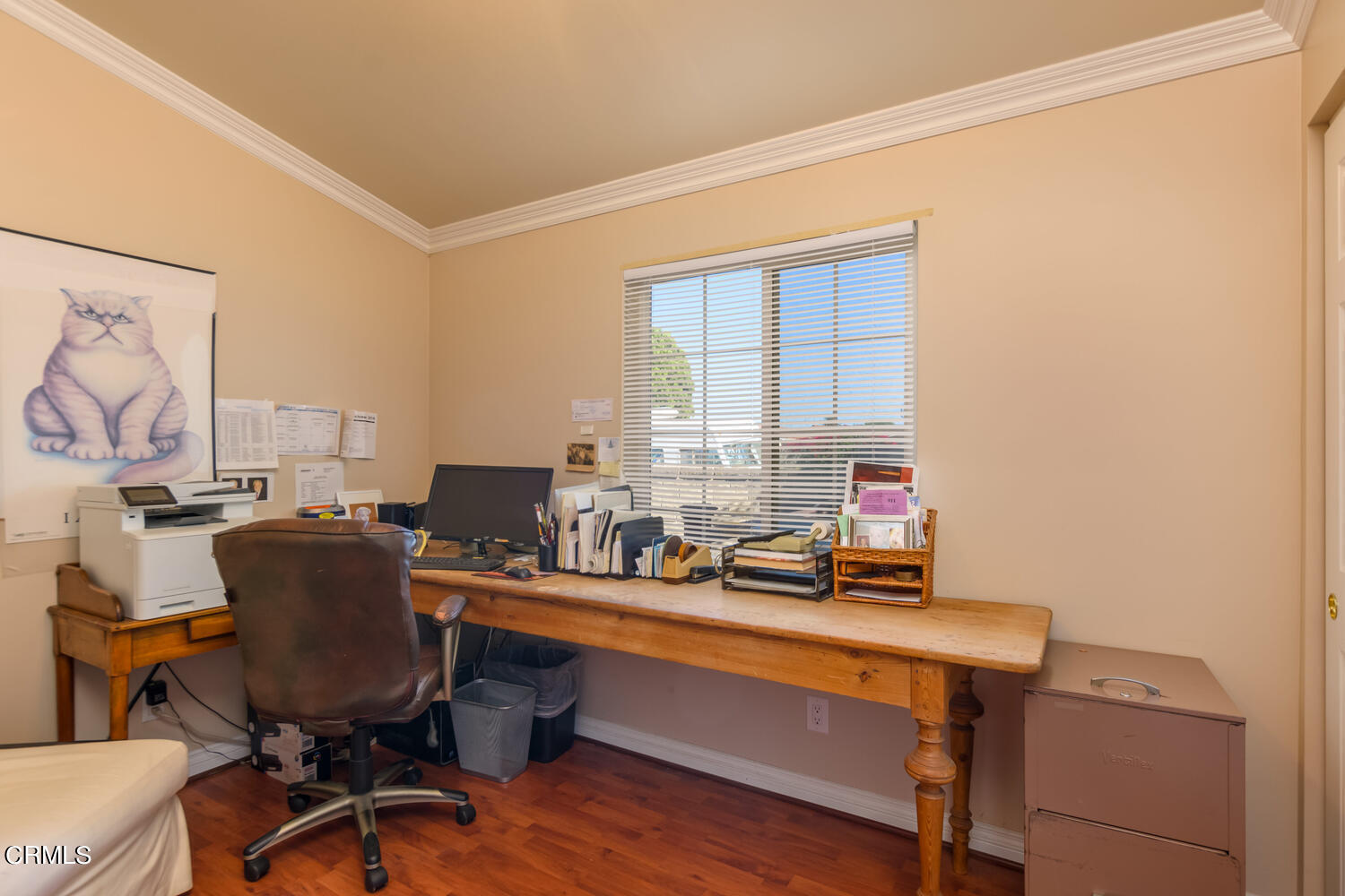 11405 Darling Road, Unit 1 Ventura, CA 93004 - Photo 16 of 31 a view of a workspace with furniture and a window